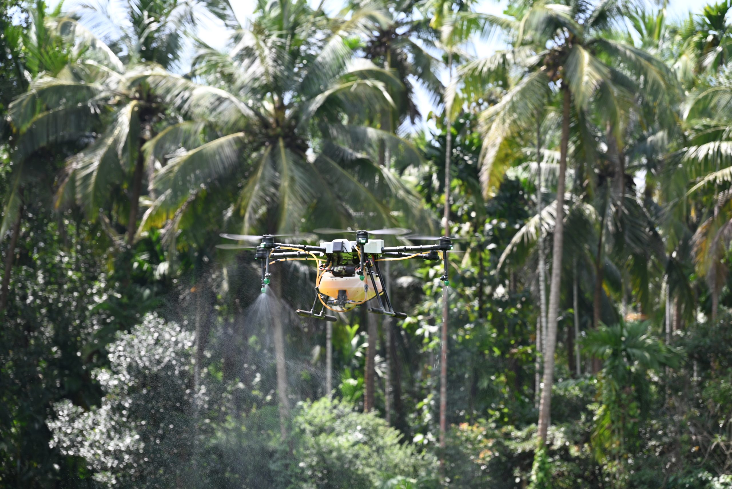 Agricultural drone flying over a rural field