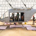 NASA researchers prepare an eVTOL test article for impact research